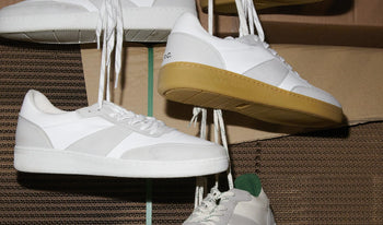 A.P.C. Women Sale Shoes - Plain sneakers hanging from shelf.