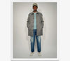 A.P.C. Men - Man wearing grey wool coat with blue faded jeans and green baseball cap.