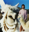 A.P.C. x Tame Impala - Men model shot with lamas around him