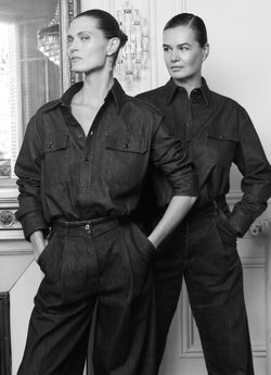 A.P.C. x Anastasia Barbieri campaign image,  featuring  2 women. On the left a model wearing full denim outfit, on the right, Anastasia Barbieri wearing the same outfit