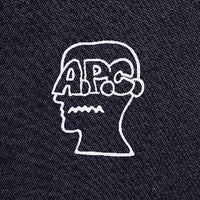 A.P.C. Brain Dead - collaborative logo on denim fabric