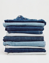 A.P.C. Denim - pile of folded denim