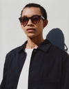 A.P.C. Eyewear - Male model wearing a pair of sunglasses